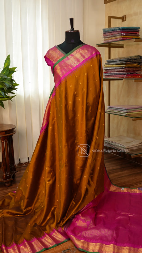 Pure Gadwal Silk With Zari Butta And Contrast Zari Border
