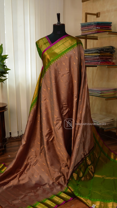Pure Gadwal Silk With Zari Butta And Contrast Zari Border