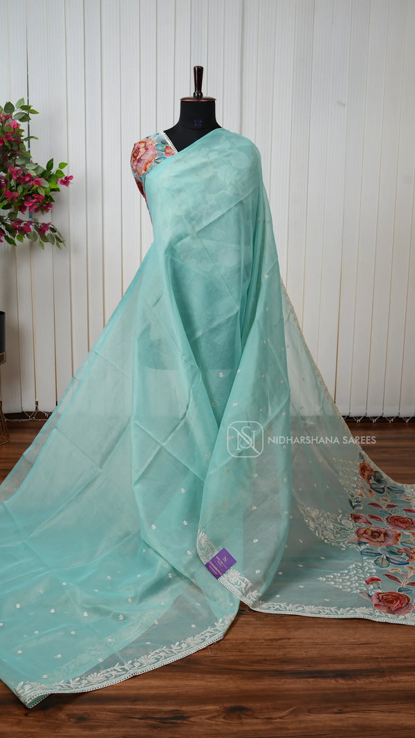 Organza Saree With Elegant Floral Embroidery And Patchwork Detailing