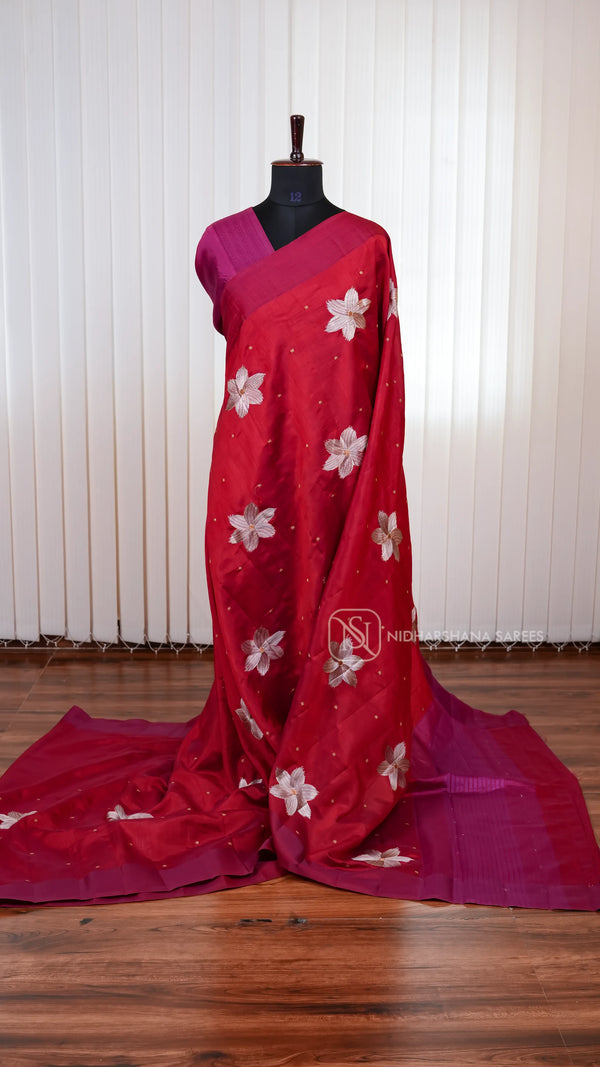 Raw Silk Saree with Floral Embroidery on the Body and Elegant Border Concept
