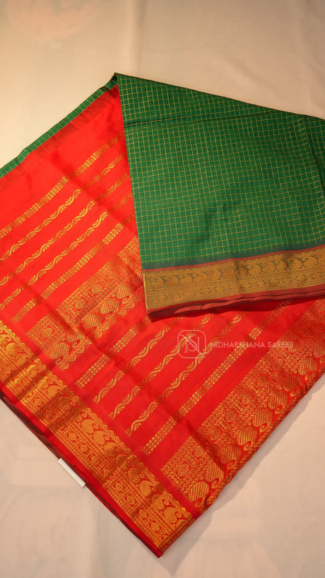 Premium Silk Cotton With Zari Checks And Contrast Zari Border