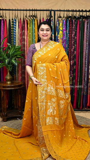Premium Crepe Silk Saree With Silver And Golden Zari Floral And Bird Motif Rich Pallu