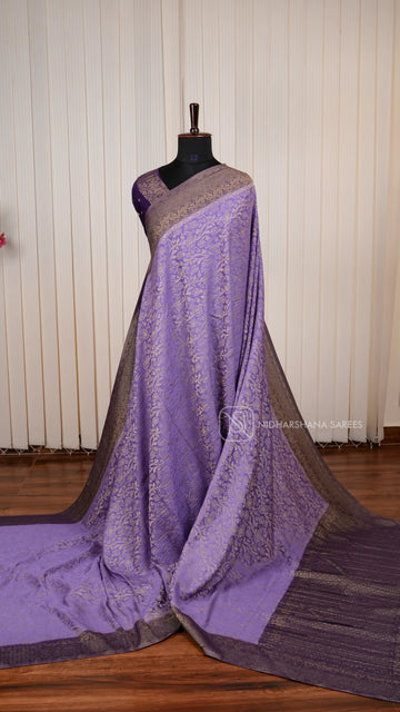Crepe Georgette Saree With All-Over Floral Design And Elegant Zari Border Concept