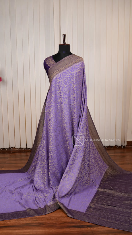 Crepe Georgette Saree With All-Over Floral Design And Elegant Zari Border Concept