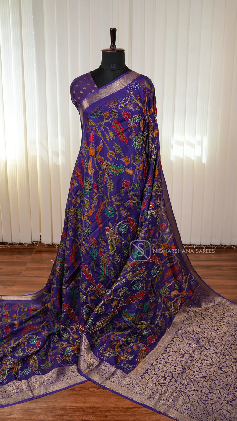 Premium Viscose Crepe Silk Saree With Kalamkari Print And Mirror Work Detailing