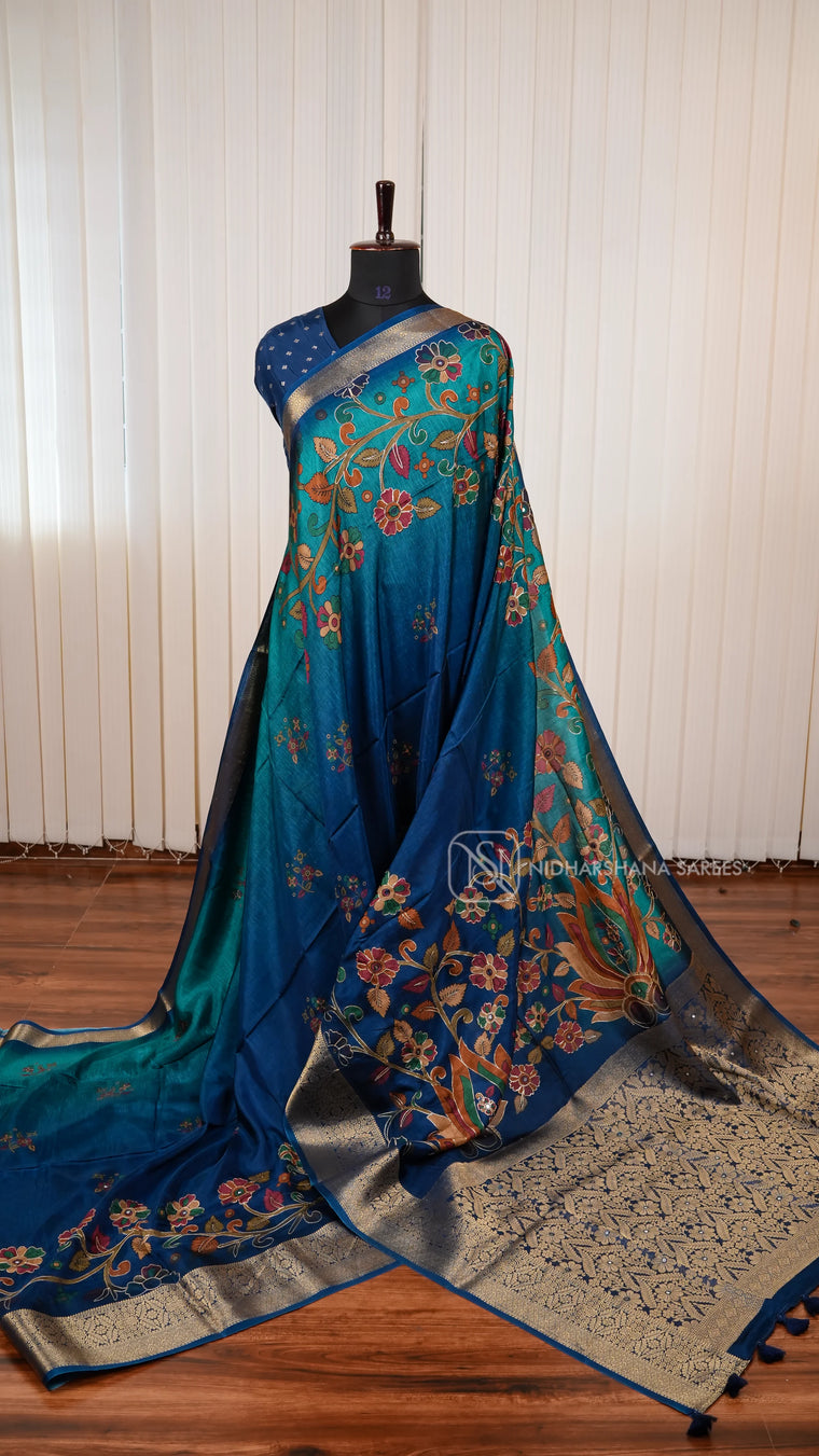 Premium Viscose Crepe Silk Saree With Kalamkari Print And Mirror Work Detailing