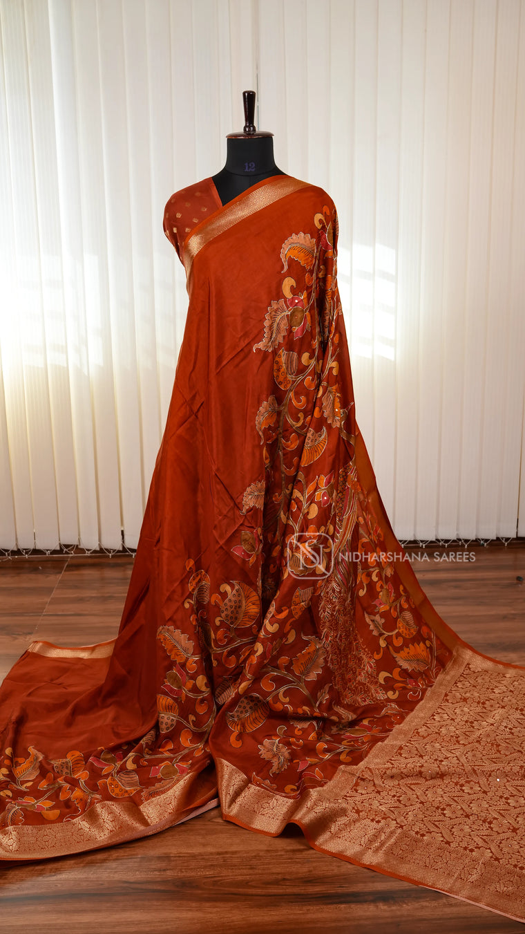 Premium Viscose Crepe Silk Saree With Kalamkari Print And Mirror Work Detailing