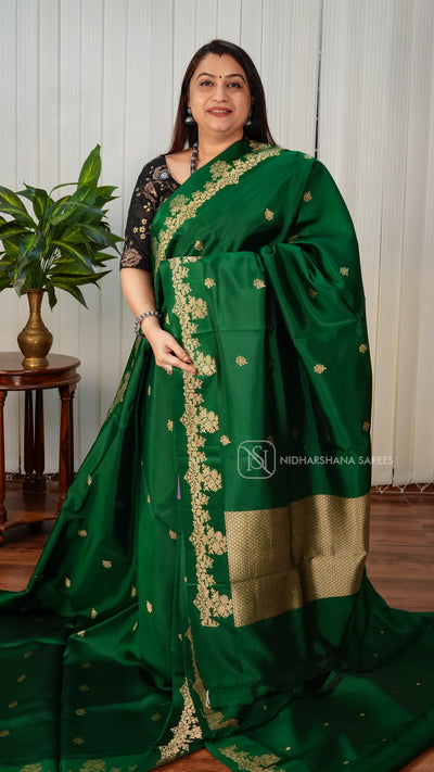 Pure Handloom Puna Silk With Zari Butta And Floral Zari Weaving Border