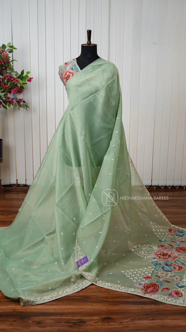 Organza Saree With Elegant Floral Embroidery And Patchwork Detailing