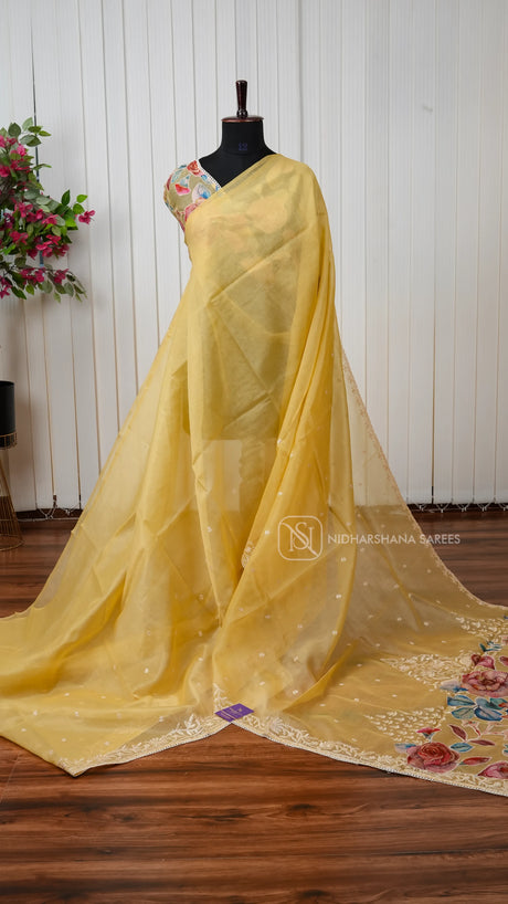 Organza Saree With Elegant Floral Embroidery And Patchwork Detailing