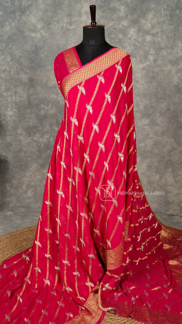 Premium Georgette With Zari Lines  And Silver Zari Peacock Weaving Concept
