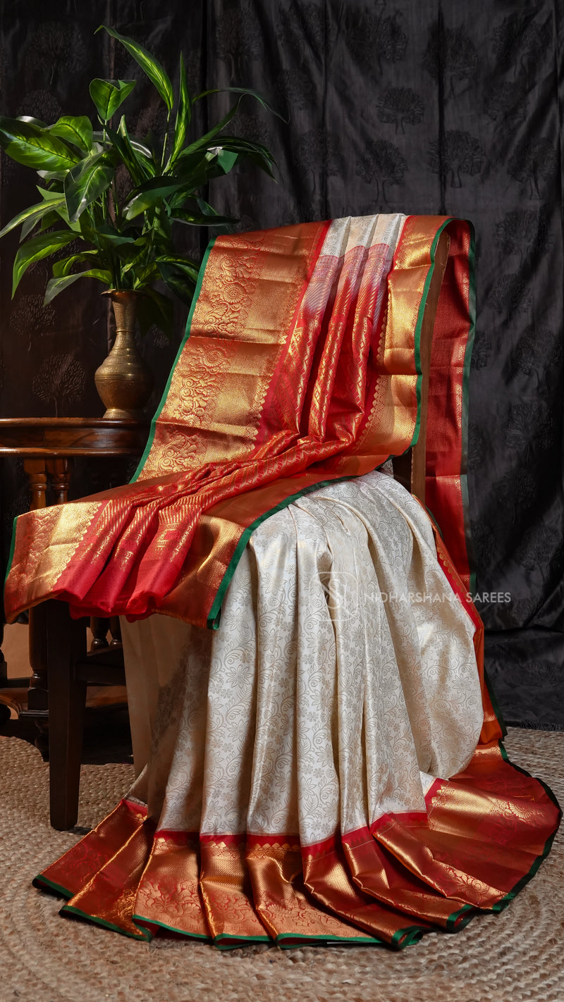 Semi Kanchipuram Silk With Floral Zari Weaving And Contrast Zari Border