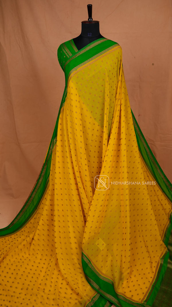 Premium Crepe Silk With Zari Butta And Contrast Antic Zari Gap Style Border