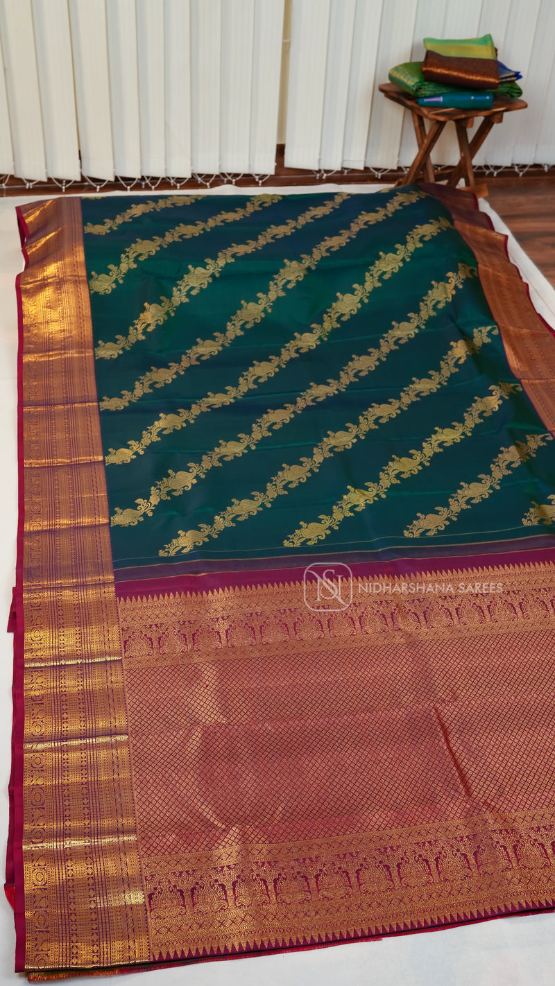 Pure Kanchipuram Silk Saree With Mango Motif And Lehariya Concept Zari Weaving And Contrast Zari Border