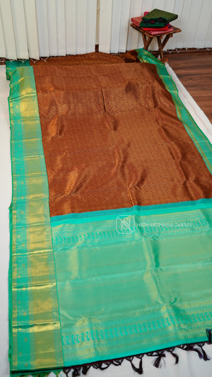 Pure Kanchipuram Silk Saree With Floral Zari Weaving And Contrast Zari Border