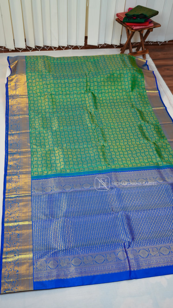 Pure Kanchipuram Silk Saree With Floral Zari Weaving And Contrast Zari Border