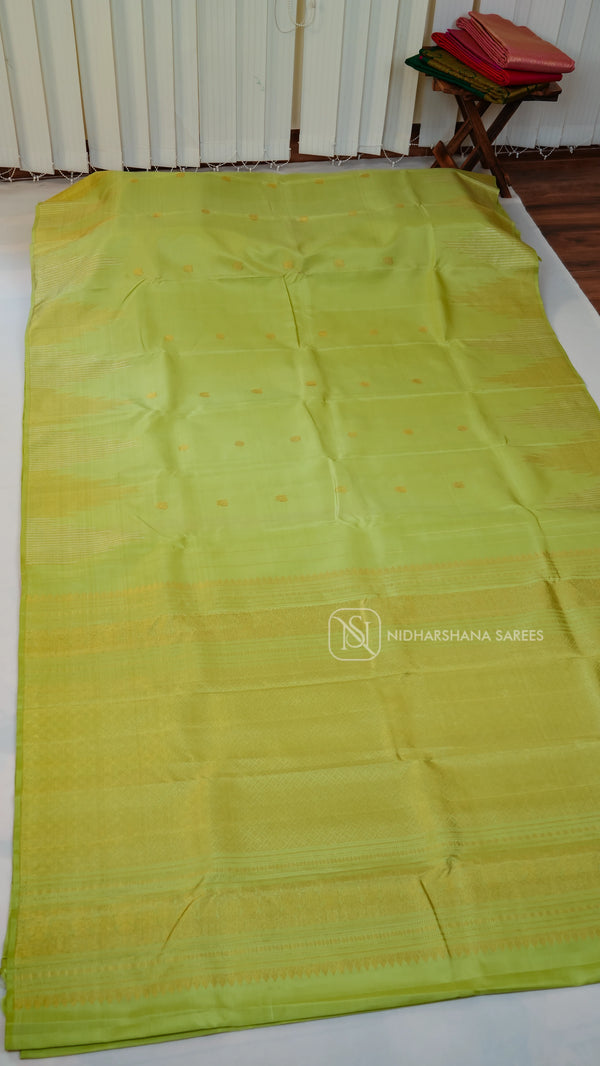 Pure Kanchipuram Silk Saree With Peacock Motif Weaving Butta And Temple Zari Lines On The Border
