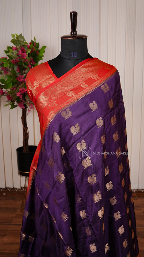 Premium Viscose Silk With Zari Peacock Motif And Contrast Zari Border