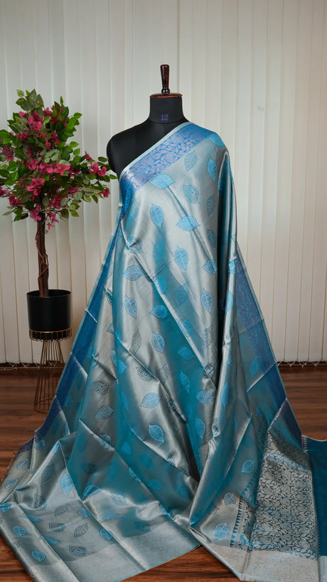 Tissue Saree With Leaf Butta And Zari Border