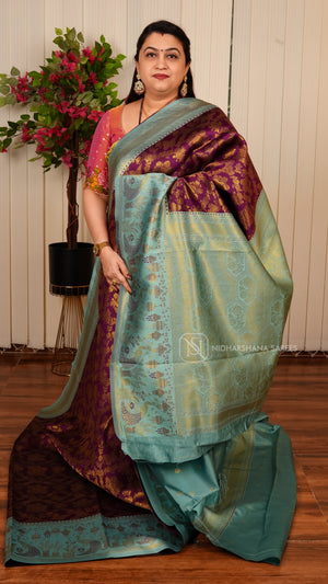 Semi Silk With Floral Zari Weaving And Contrast Border