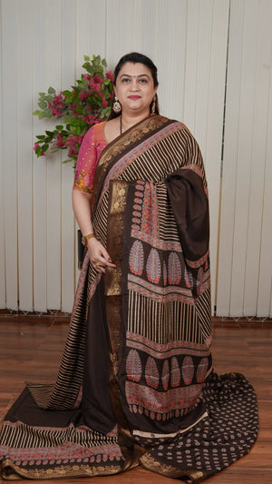 Semi Dola Saree With Ajarak Printed And Zari Border