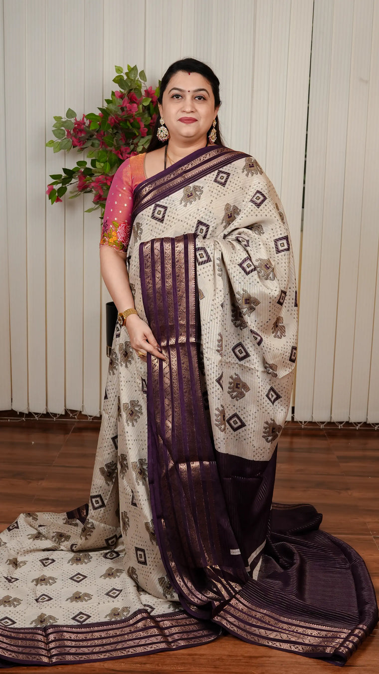 Semi Dola With Zari Lines And Patola And Bandhej Concept