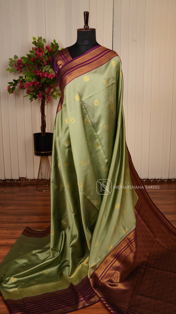 Semi Silk With Zari Butta And Contrast Zari Border