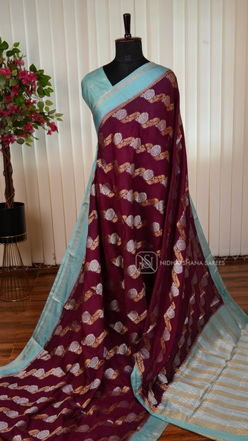 Semi Mysore Crepe Silk Saree With Silver Floral Zari And Contrast Border