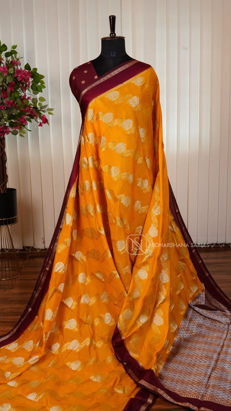 Semi Mysore Crepe Silk Saree With Silver Floral Zari And Contrast Border