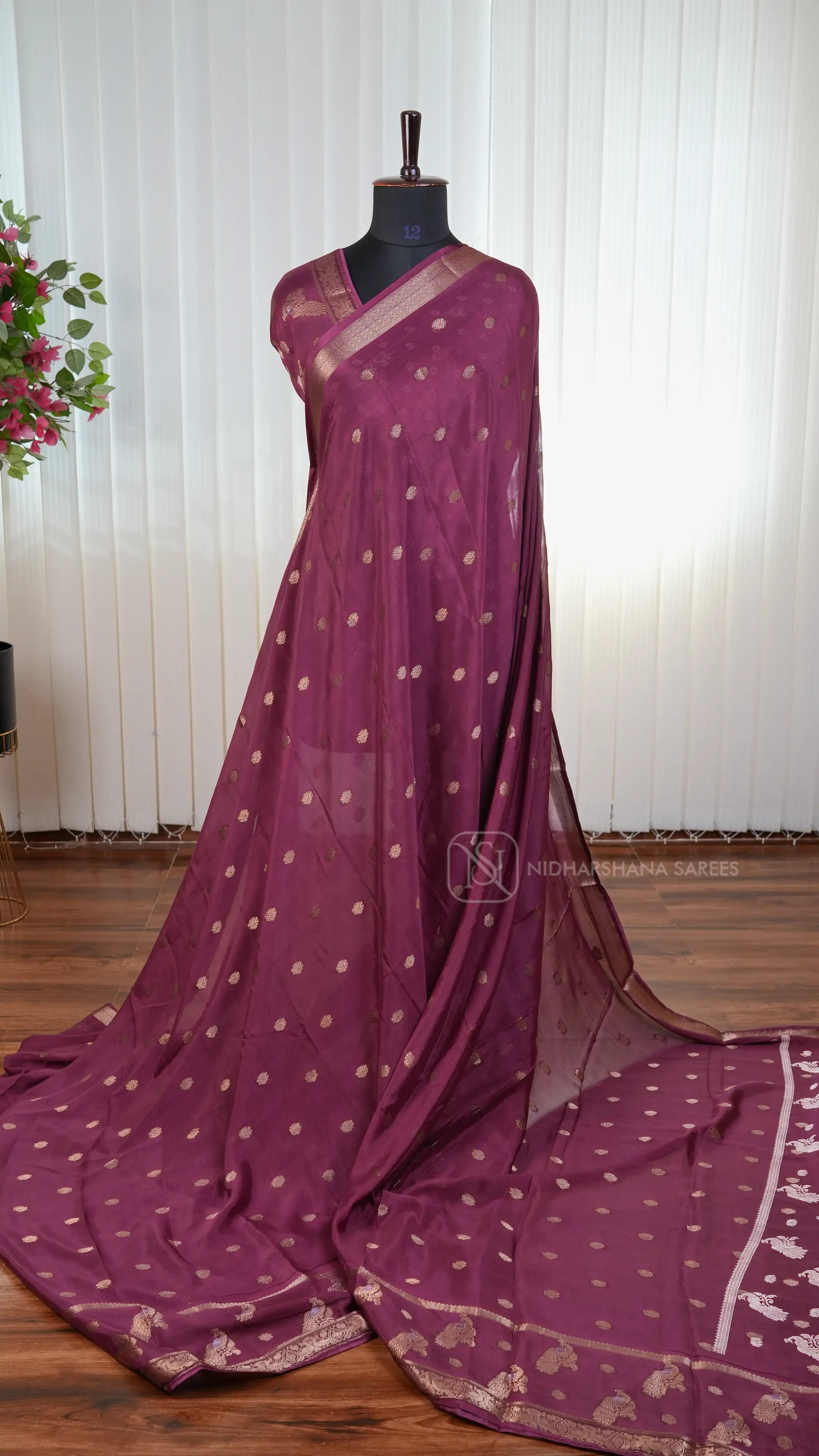 Premium Crepe Silk Saree With Zari Butta And Peacock Butta Border