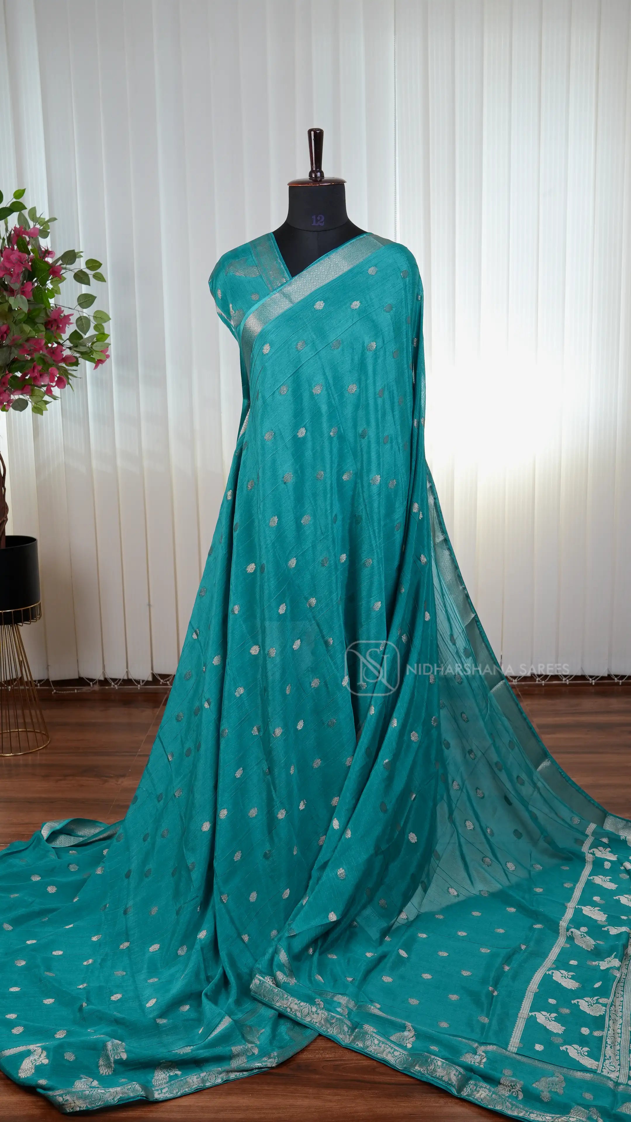 Premium Crepe Silk Saree With Zari Butta And Peacock Butta Border