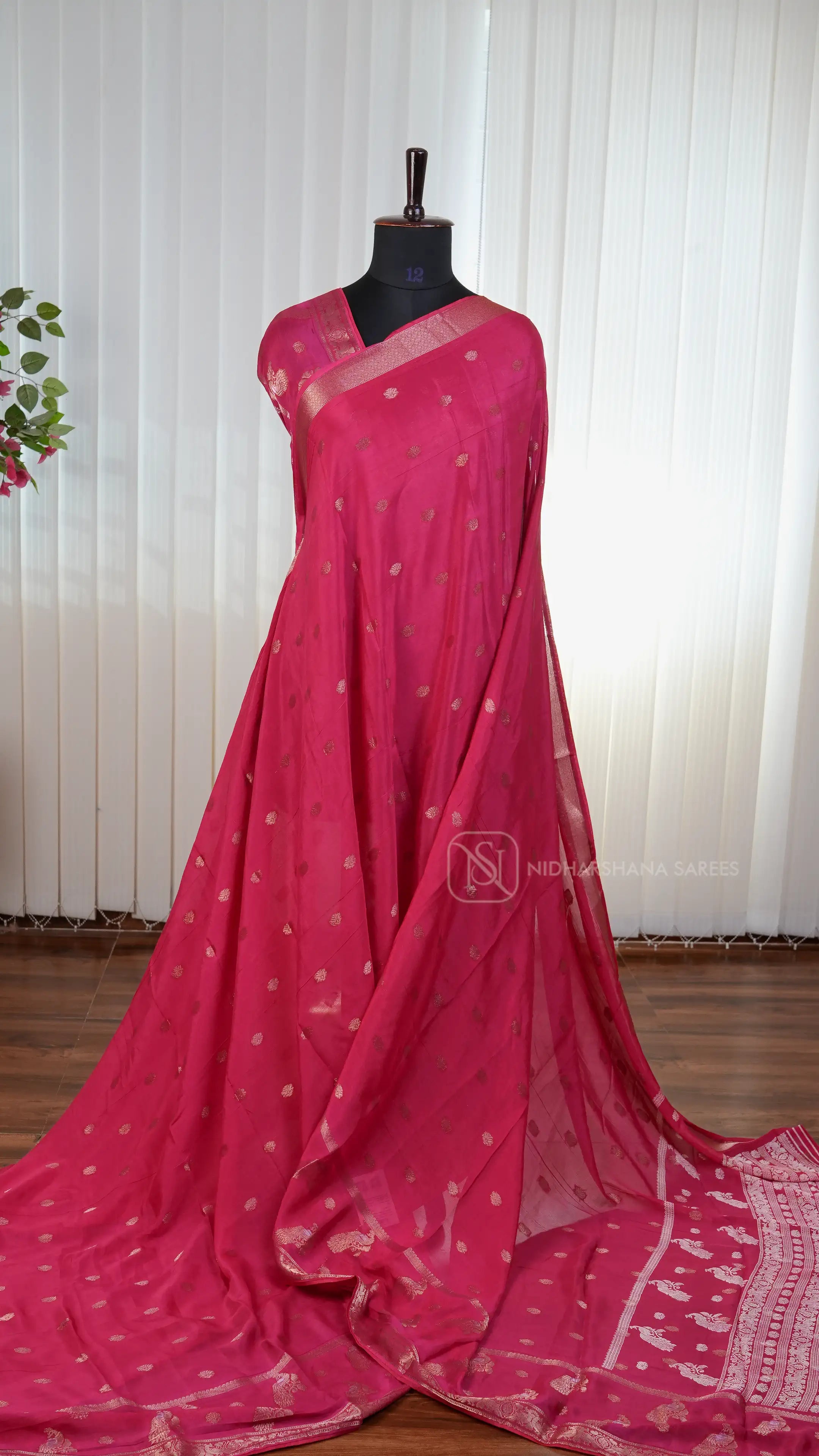 Premium Crepe Silk Saree With Zari Butta And Peacock Butta Border