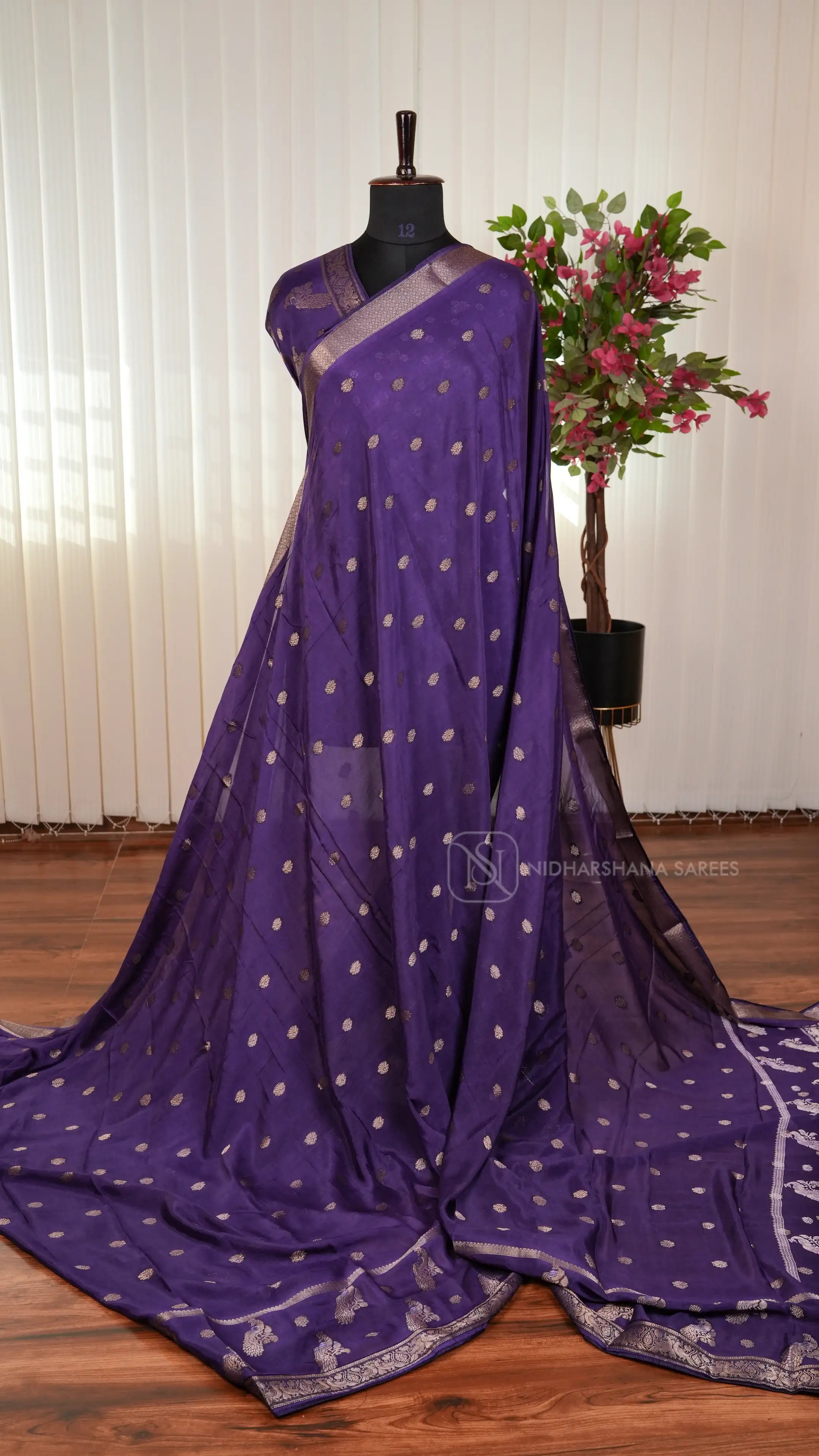 Premium Crepe Silk Saree With Zari Butta And Peacock Butta Border