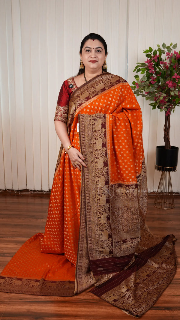 Semi Georgette Saree With Zari Butta And Elephant Weaving Contrast Border