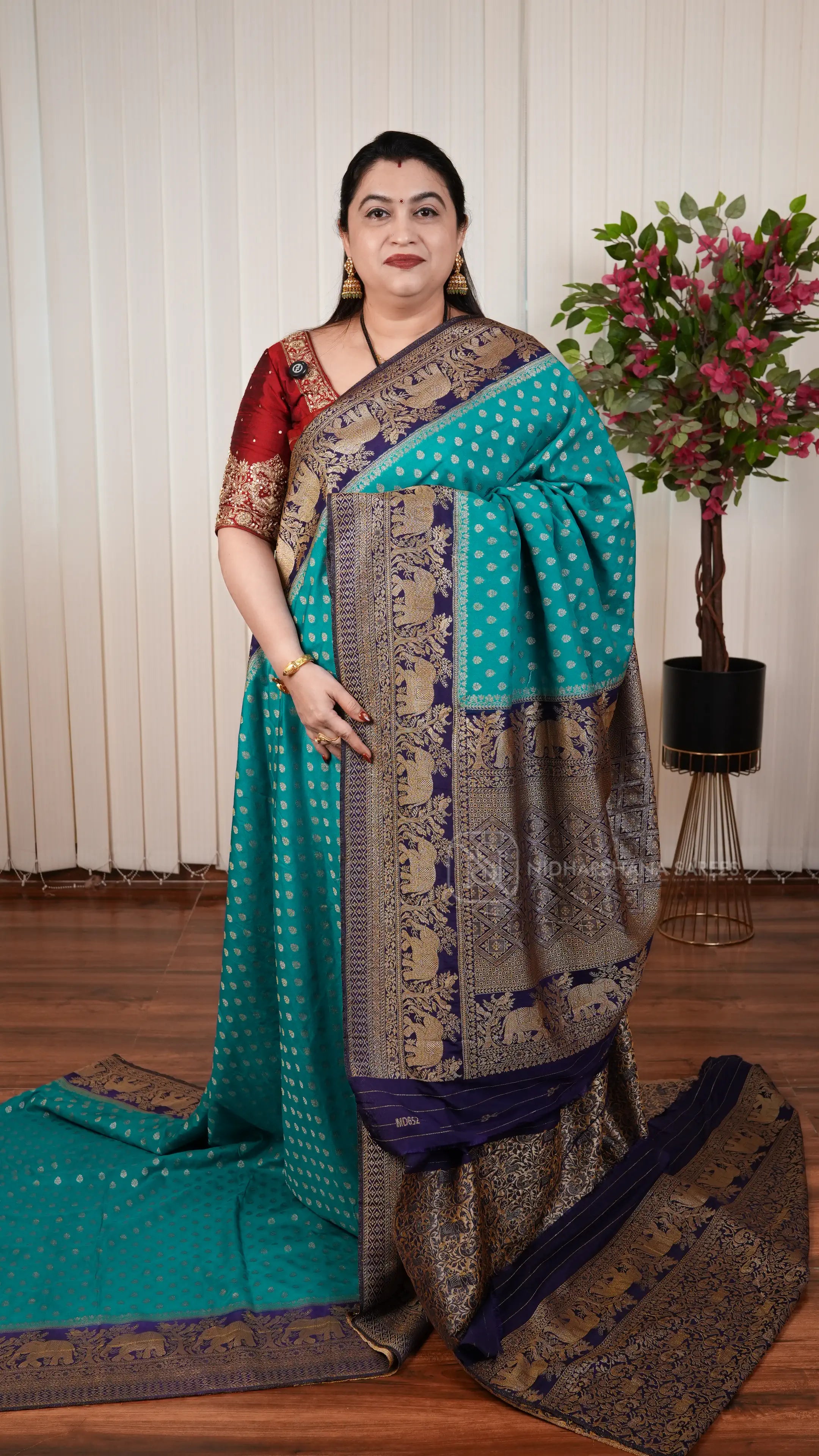 Semi Georgette Saree With Zari Butta And Elephant Weaving Contrast Border