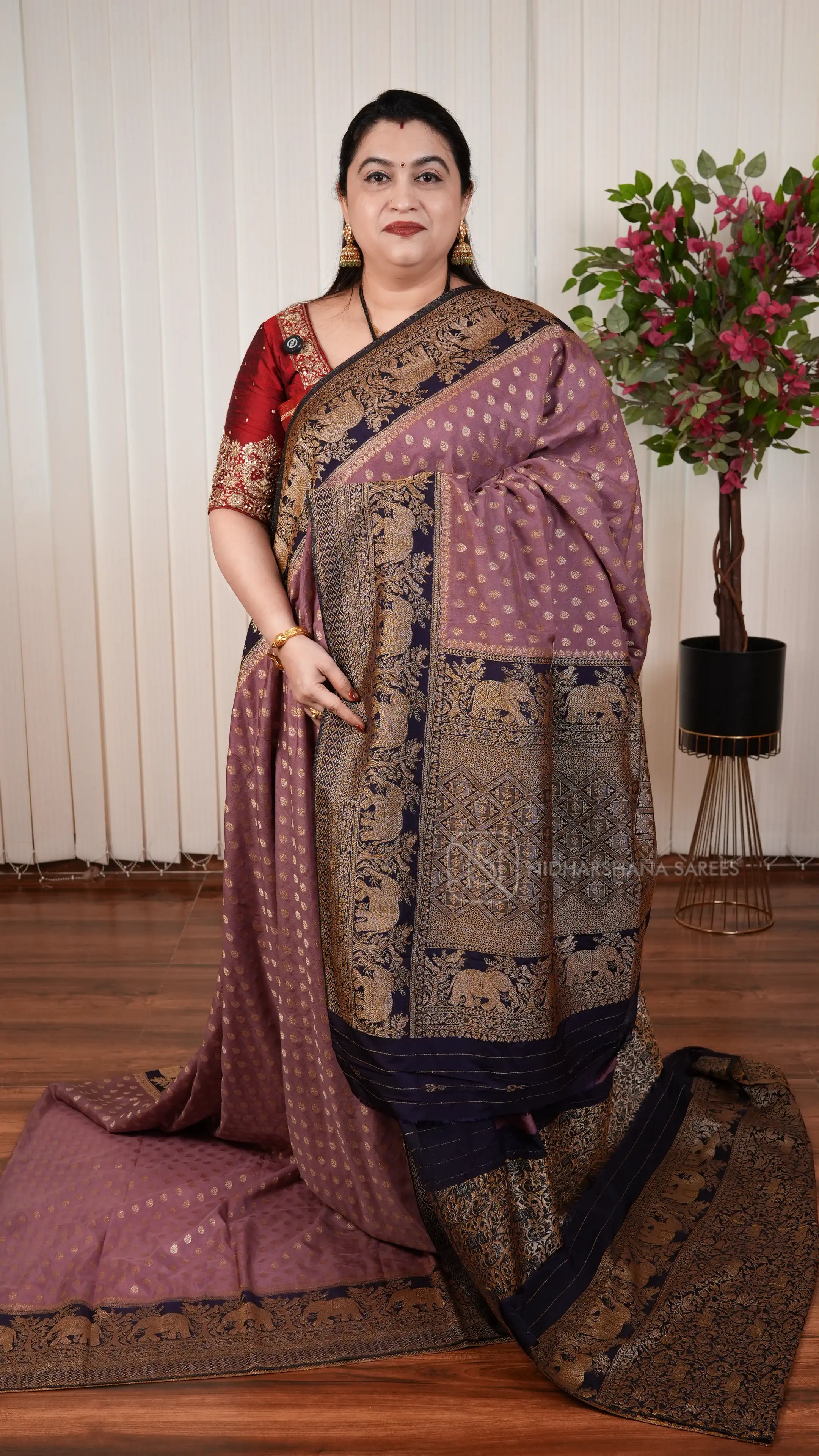 Semi Georgette Saree With Zari Butta And Elephant Weaving Contrast Border