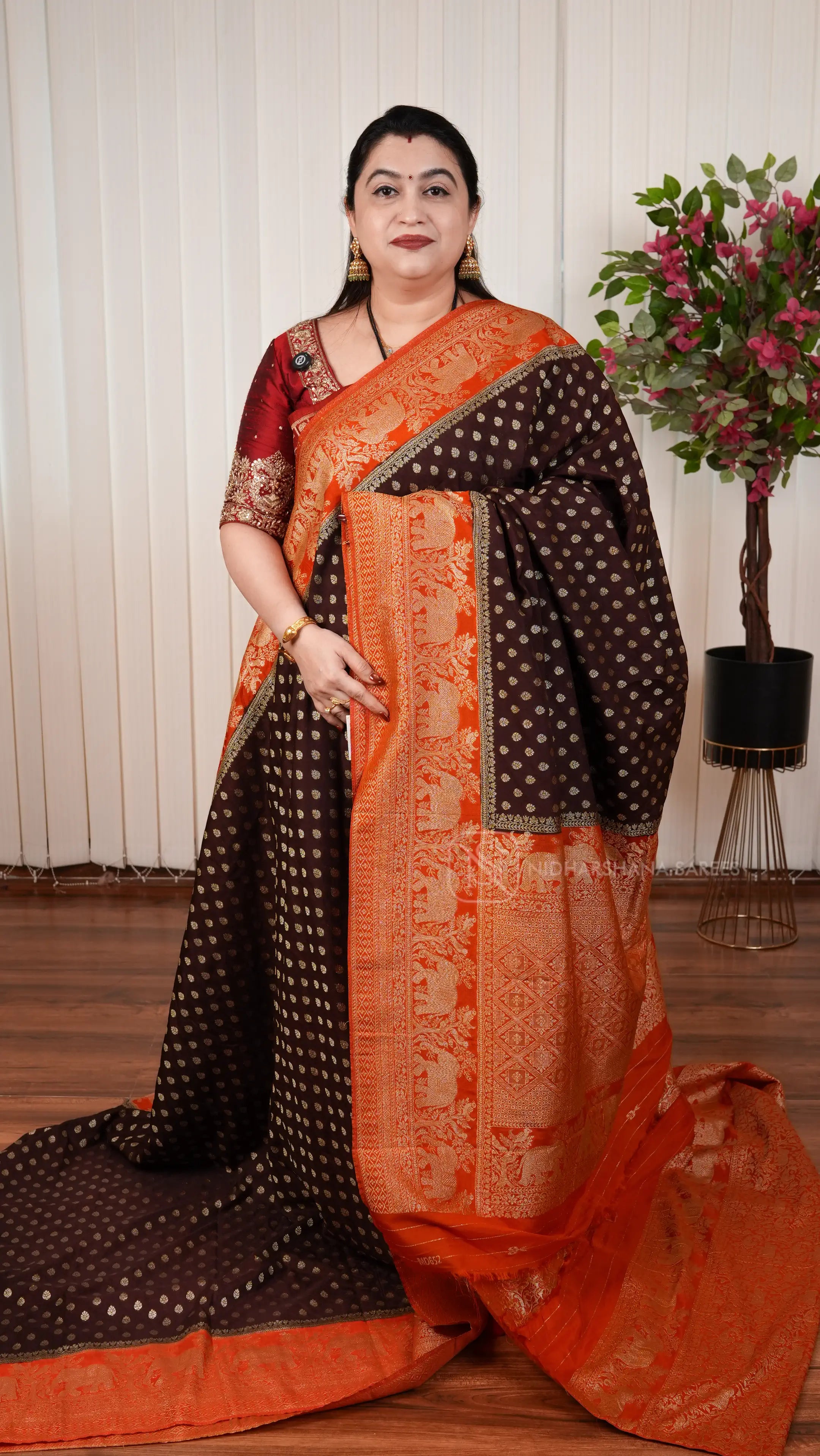 Semi Georgette Saree With Zari Butta And Elephant Weaving Contrast Border