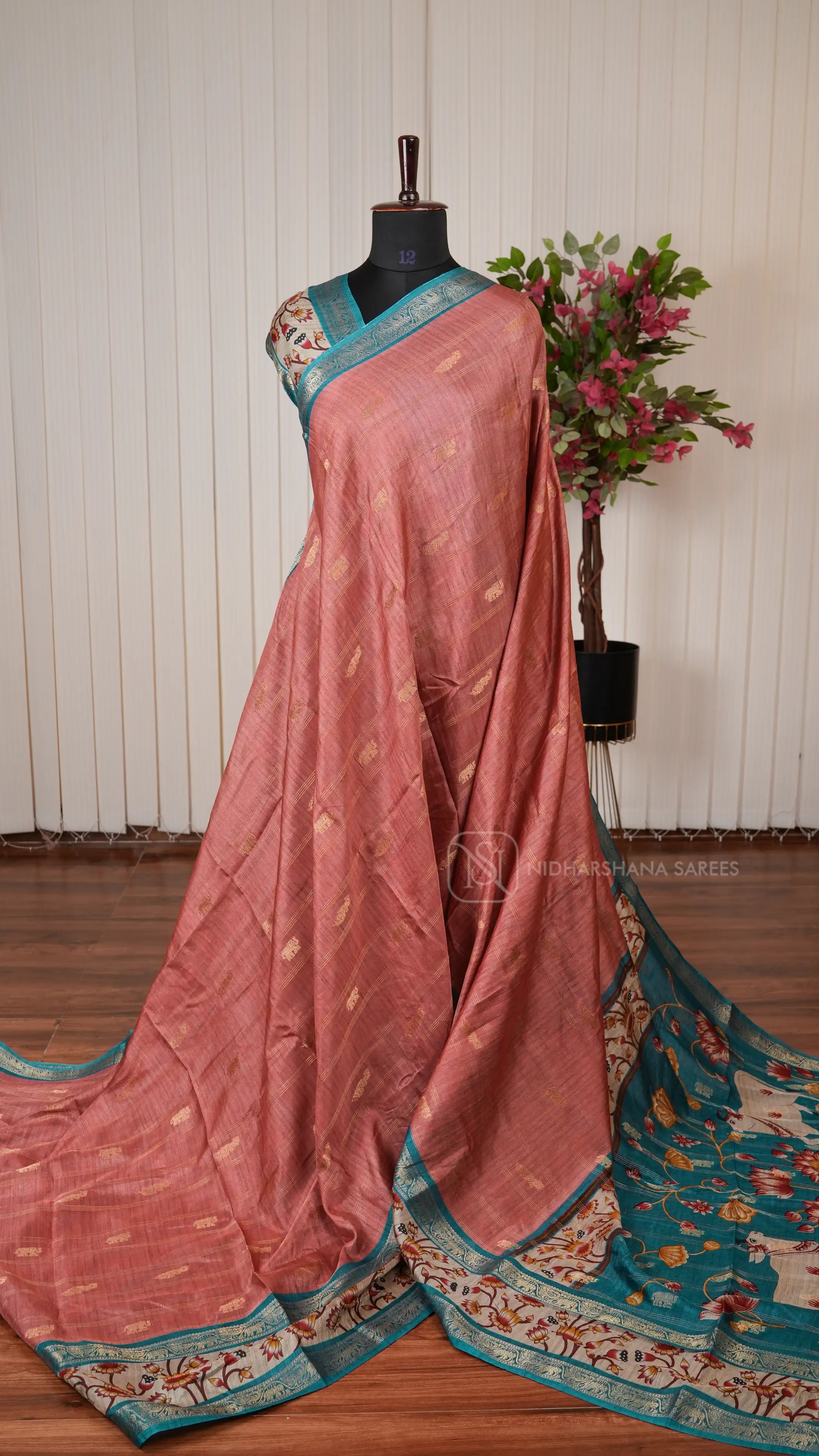 Tussar Cotton With Zari Peacock And Elephant Motifs  And Pichwai Print Border