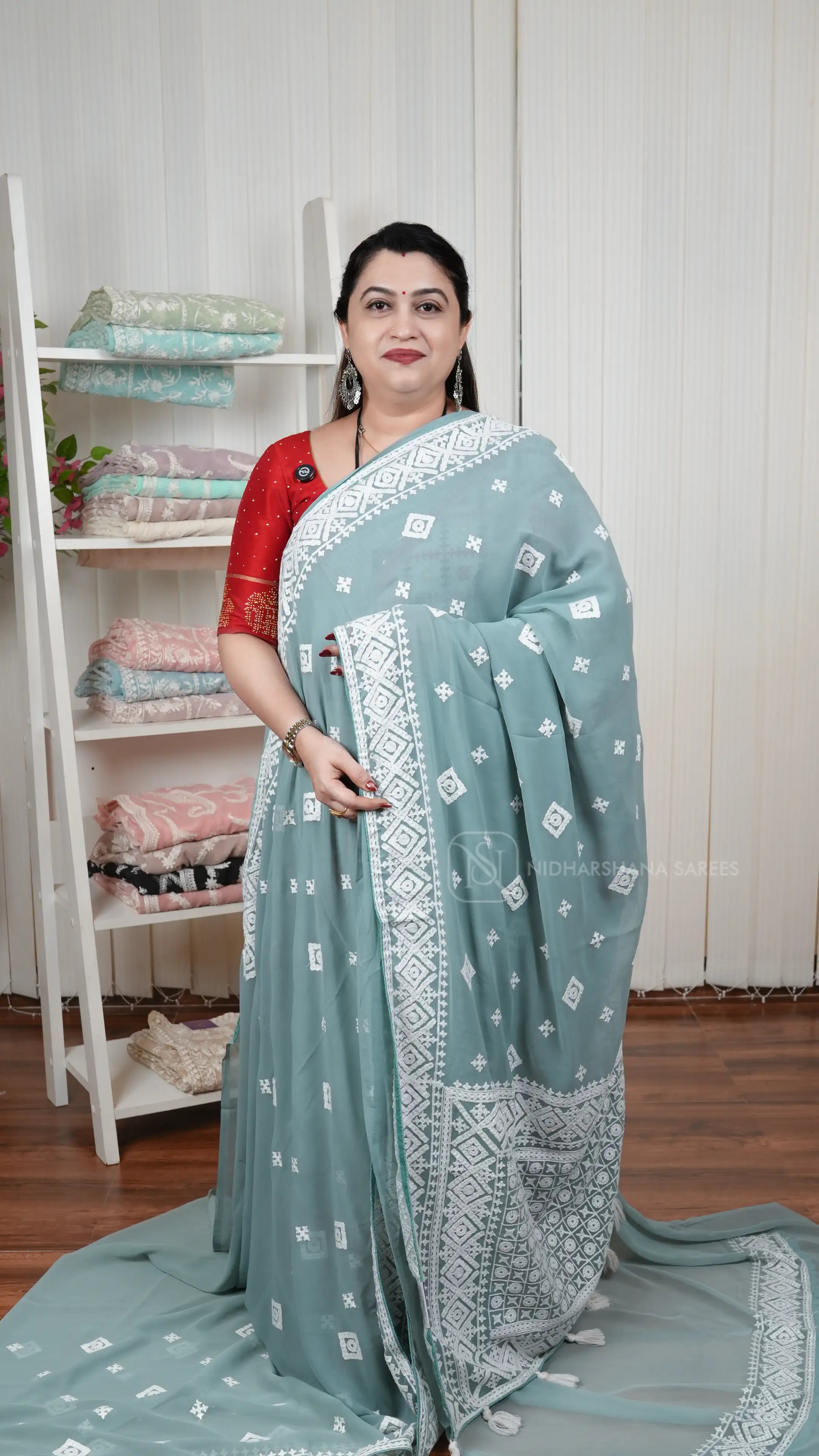 Lightweight Georgette Party Wear Saree With Intricate Geometric Embroidery