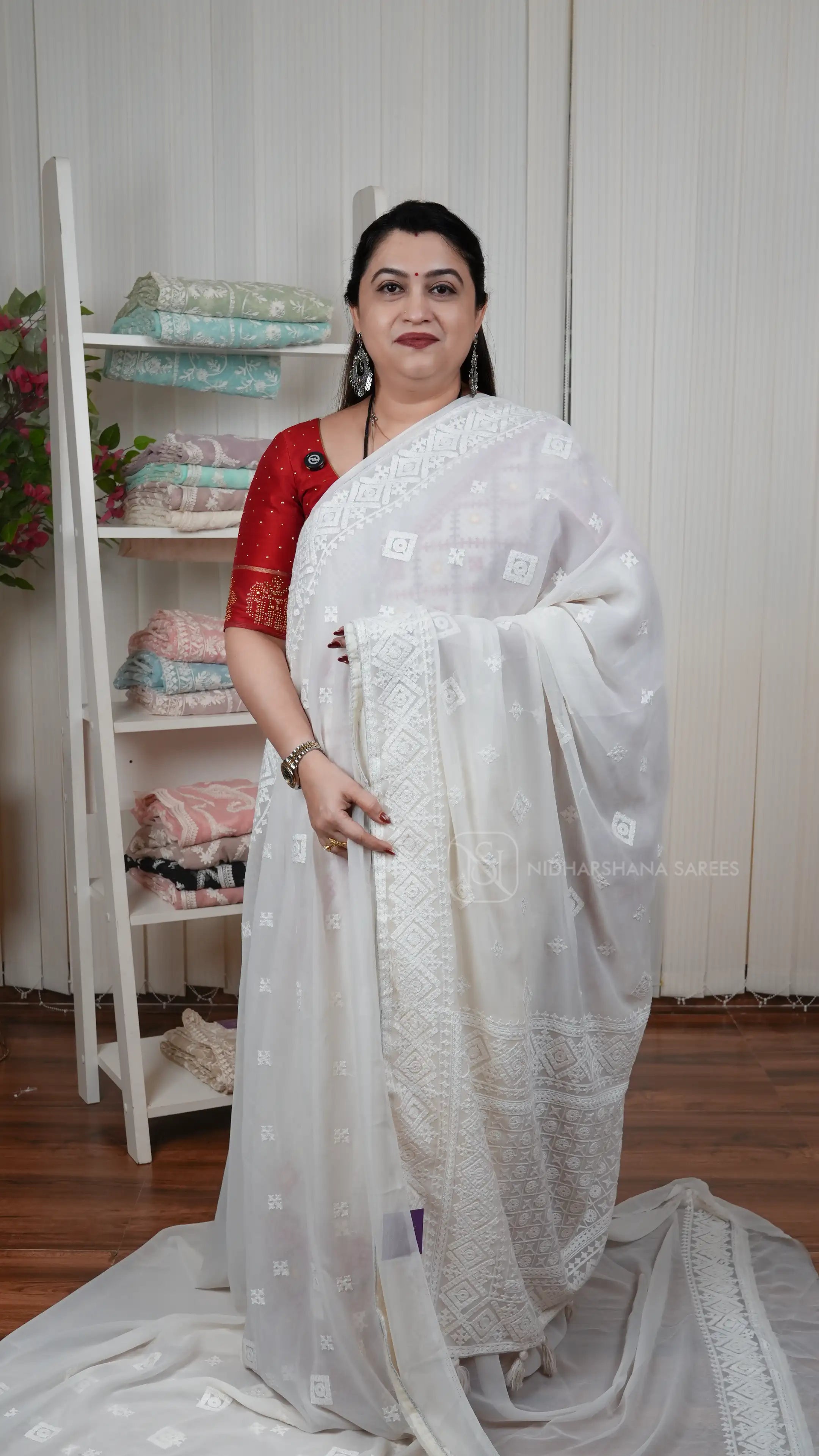 Lightweight Georgette Party Wear Saree With Intricate Geometric Embroidery