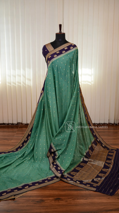 Semi Georgette Saree With Elegant Zari Butta Motifs And Classic Ethnic Border