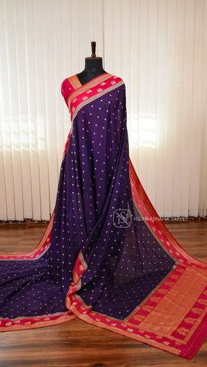 Semi Georgette Saree With Elegant Zari Butta Motifs And Classic Ethnic Border