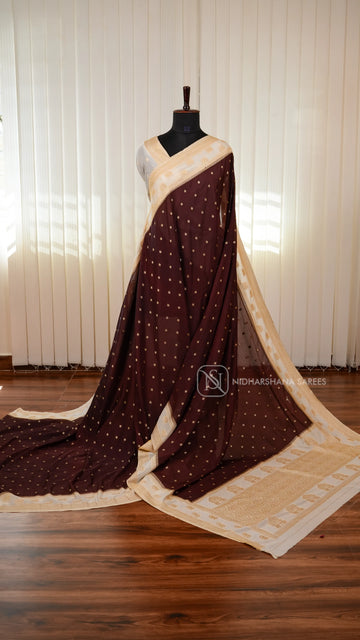Semi Georgette Saree With Elegant Zari Butta Motifs And Classic Ethnic Border