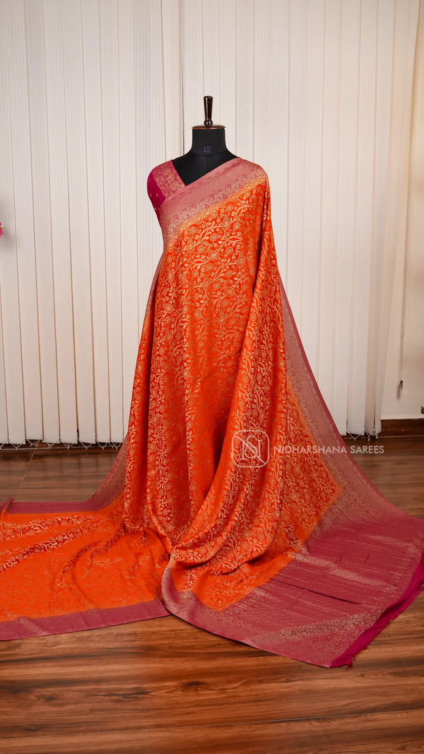 Crepe Georgette Saree With All-Over Floral Design And Elegant Zari Border Concept