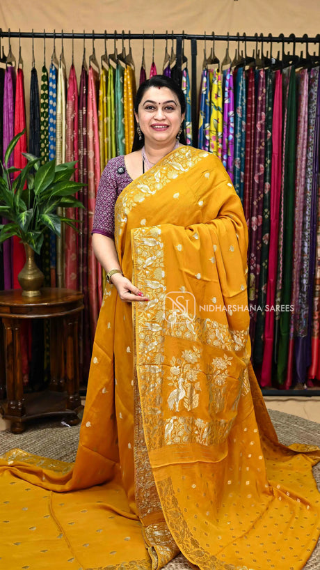 Premium Crepe Silk Saree With Silver And Golden Zari Floral And Bird Motif Rich Pallu