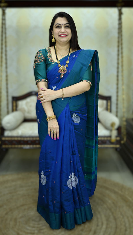 Raw Silk With Peacock Copper And Silver Zari Motif